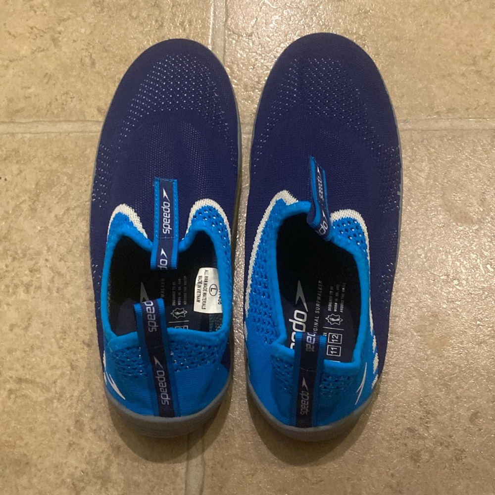 Blue Speedo Men’s swim shoes, fits size 11 or 12